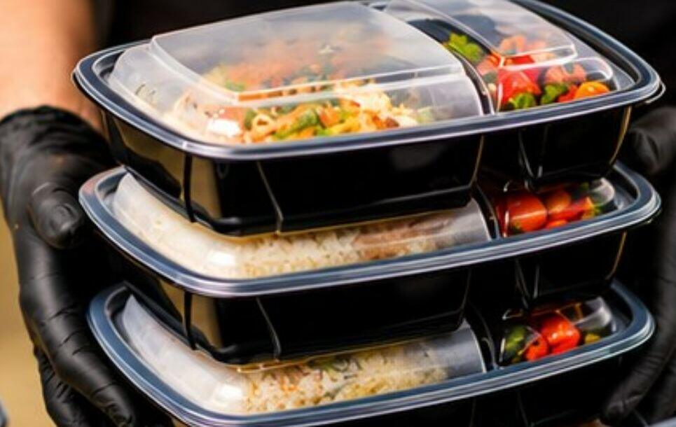 Boxed meals stacked for delivery