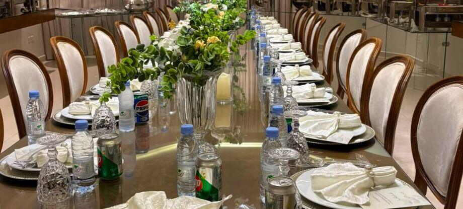 Long dining table set for a corporate event
